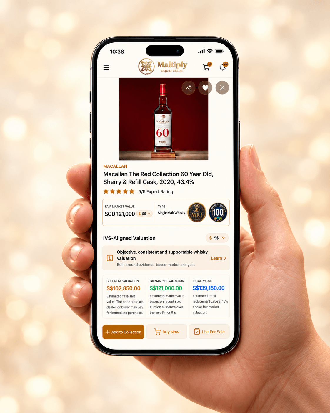 Maltiply whisky valuation displayed on a phone held beside a whisky glass